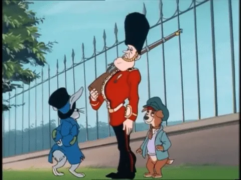 A dog Oliver Twist steals the hat from a Buckingham Palace guard while a rabbit Artful Dodger distracts him