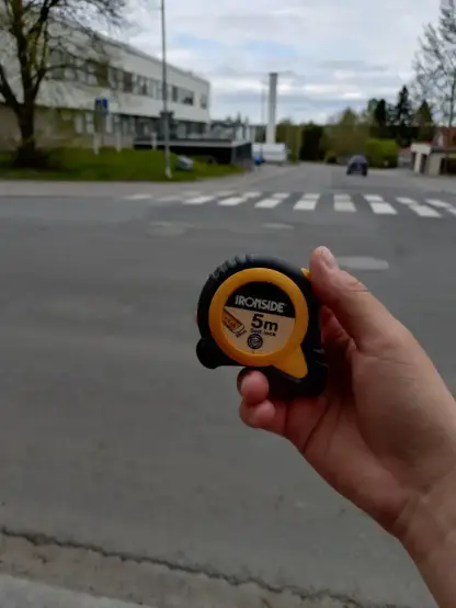 I'm holding tape measure