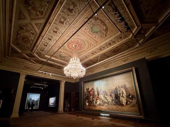 A ballroom with huge painting