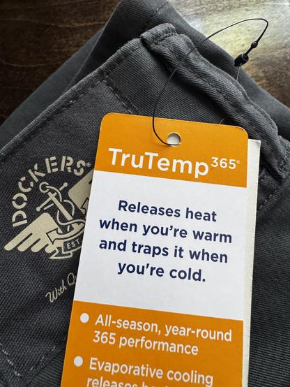 A photo of Docker's TruTemp365 tag on the waist band of a pair of pants.