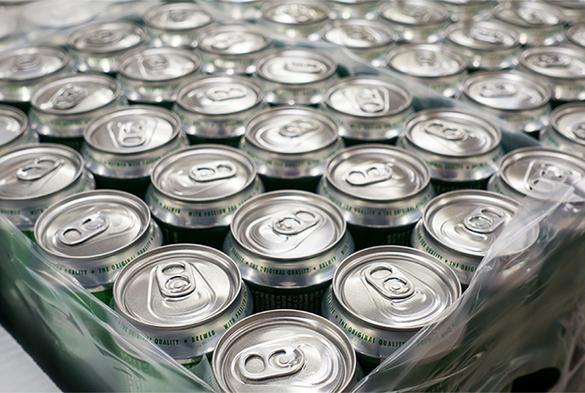 Close up of the tops of a two-four of cans