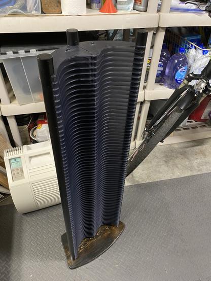 the CD tower shelving unit cleaned up and attached to the new wooden baseplate, in my less-cluttered-than-it-looks workshop