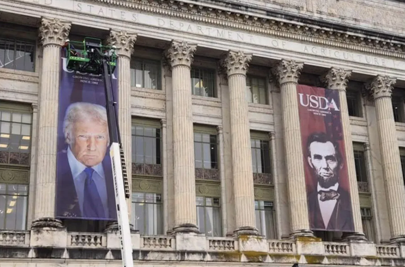 Picture credited to @peoplefor via X

Photo of the USDA building where a giant 3-story poster of Trump is being hung next to a similar poster of Lincoln (who founded the USDA).