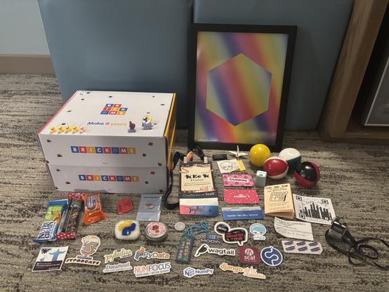 A giant pile of stuff I made winning bids for at the PyLadies auction, now arranged neatly. More detailed description coming later when I'm not exhausted.