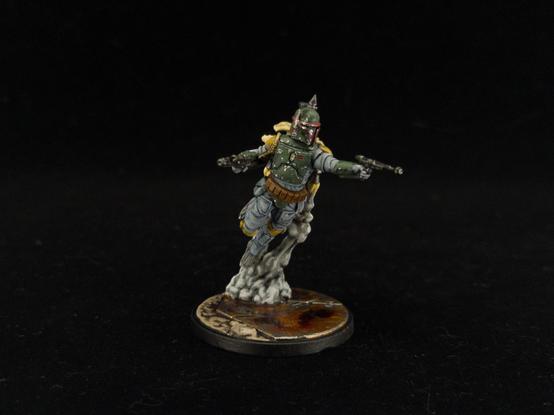Painted Boba Fett mini for Star Wars Shatterpoint, taking off with his jetpack and wielding two blasters.