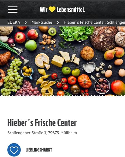 Aufschrift: Hiebers Frische Center Müllheim

Darüber eine Theke mit frischem Käse/Obst/Gemüse

Quelle: Screenshot der Webseite der Firma