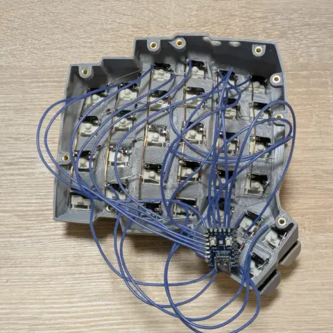 Right side of my DIY split keyboard all wired up to a RP2040-Zero microcontroller.
