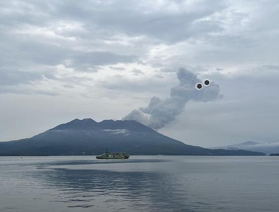 The above volcano emitting a dragon shaped cloud of ash, now with googly eyes.