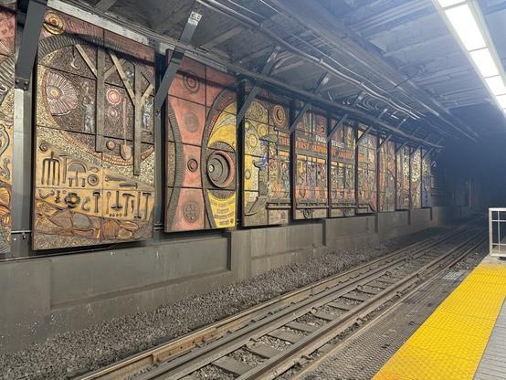 intricate mural on wall of Park Street station, “The first subway in America”. Looks to made with parts of rail lines and tools, or at least look like it was.