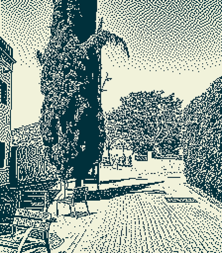 Imagen en 1 bit  de un camino empedrado con un ciprés a la izquierda y  setos a la derecha