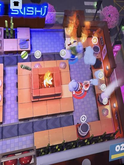 A photo of everything on fire in the Overcooked game