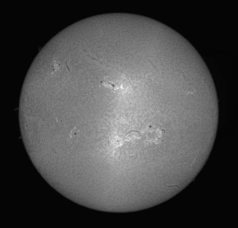 The full solar disk in H-Alpha light, 26 december 2024. Mono image. 
To read about the technical details and see the RGB and annotated versions, follow the link in the post.