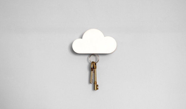 A wall mounted keyholder in the form of a cloud.