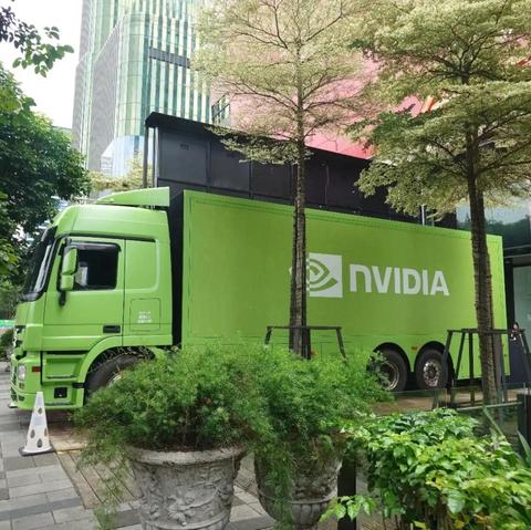 photo of a green truck with nvidia branding. image taken from Gamer's Nexus.
