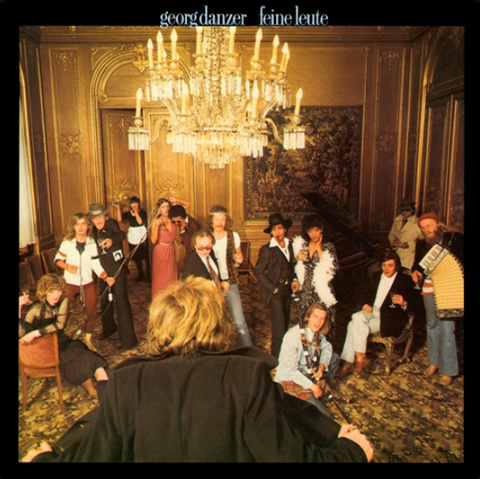 This is an image of the album cover of Georg Danzer's long-playing record "Feine Leute" from 1979. 

On this cover you can see the back of young Georg as he opens his coat in an exhibitionistic way in front of a frightened "high society" of rich snobs in a correspondingly fine ambience and lets them see the naked truth.. You can find the translated text of the title track "Feine Leute" here:

Fine people 

Fine people never sweat 
never go to work either 
Fine people never lie 
Tell only the truth 
Fine people never pee in the flower vase 
Never fall out of roll or on the fine nose 
Oh, they were born under a fine star 
Oh, I just like fine people 

Fine people drinking tea  and eat cake 
Sitting on the couch 
You never hear them cursing 
Fine people are well-groomed,
honest, nice and open 
are built up by higher things 
and affected by the suffering of others 
everything all too human is far from them 
Oh, I just like fine people 

Fine people are loyal 
But only to their own kind 
And they're so liberal 
They're so nice, the rich ones 
Fine people thank God, 
because they are so happy 
That they are fine people, 
well, that's just the way it is 
Yes, I love you, ladies gentlemen 
Oh, I just like fine people