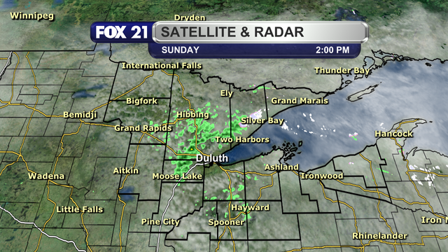 The satellite and radar over the Northland at 2 p.m. on Sunday, May 18, 2025, shows cloud cover over the region, with some breaks being observed in the Twin Ports region.  Some lingering rain shower persist in spots, with a few snowflakes possible in the Arrowhead region.  They are remaining relatively stationary but dissipating.