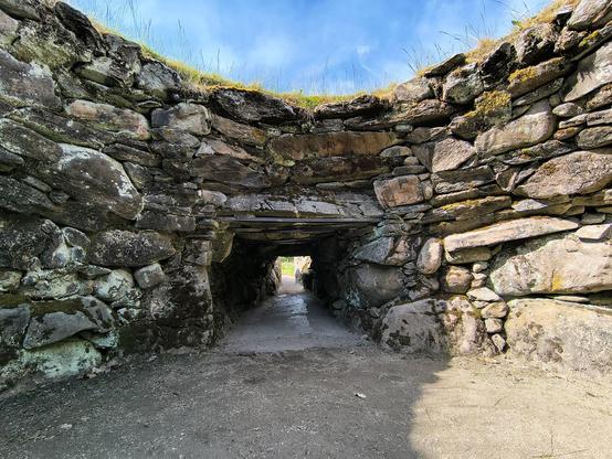 Looking back along the low passage from inside Corrimony Chambered Cairn. The roof is long gone. Lovely and sunny today.