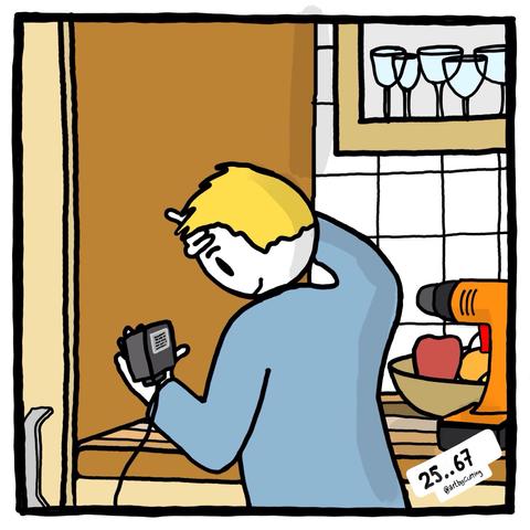 Pictured holding charger for my electric screwdriver that I found in the most unexpected place in the kitchen. Also pictured are wine glasses in glass fronted cabinet
