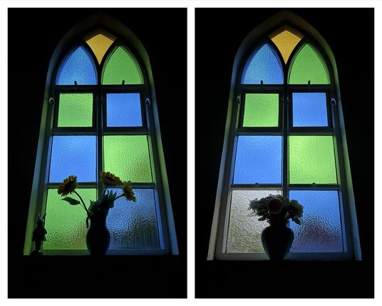 Colour diptych of two arched chapel windows with yellow, blue and green glass each with a vase of flowers on the sill