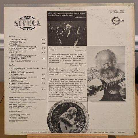 back cover with credits and more photos of Sivuca playing guitar and accordion, with quotes about how awesome he was