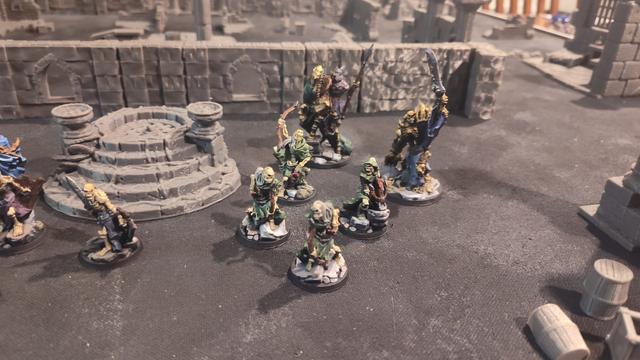 Arbiter Miniatures Legion of the Undead models painted for One Page Rules Age of Fantasy: Skirmish in a castle ruins setting. Partial army close-up photo.