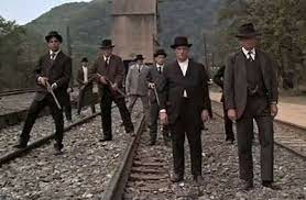 Scene from the John Sayles's film, Matewan, when armed company thugs go after striking miners.