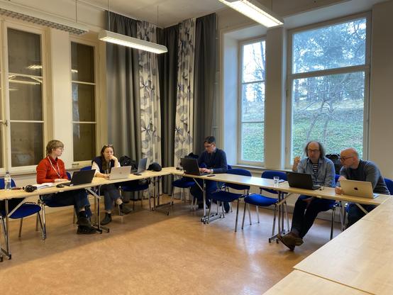 Participants within the renewable energy group working together at the Stockholm hackathon.