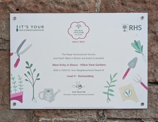 A certificate from the Royal Horticultural Society recognizes West Kirby in Bloom - Hilbre View Gardens with the 2024 Level 5: Outstanding award.