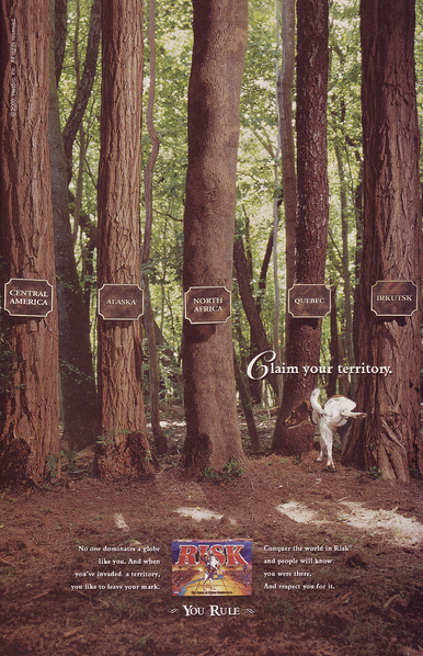 An ad for the game Risk talking up how in the game you get to "invade" and "conquer" and "leave your mark" and how people "will respect you for it," with a visual of a dog pissing on a tree.