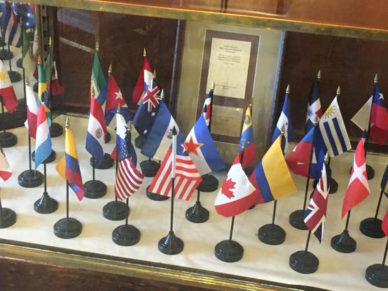 UN Flags in the case near the plaque