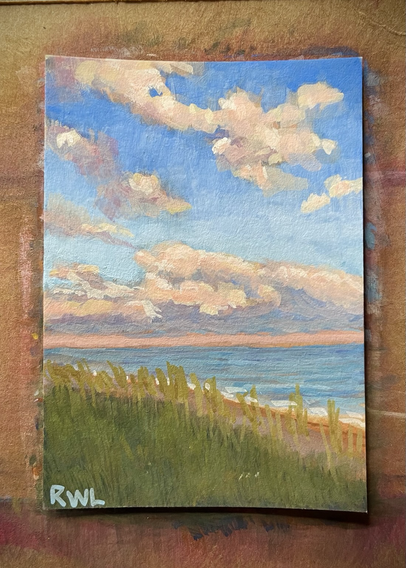 Miniature painting of clouds over the ocean at sunset, wight bright lights in the sky and a muted grassy beach at the bottom.