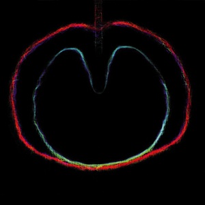 The cover of XTC's album Wasp Star: Apple Venus, vol. 2 (2000). The image is a pastel drawing of a halved apple, or one apple inside of another, in green and red.