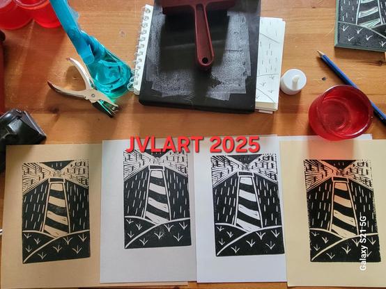 Four black ink prints of lighthouses on various neutral shades of cardstock