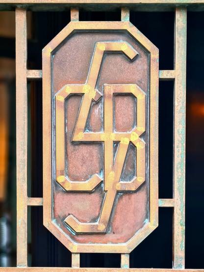 An Art Deco monogram made up of the initials C., B. and S.