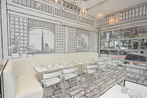 a restaurant all in black-and-white with line-drawn details on every surface so that it appears like a living 2D drawing