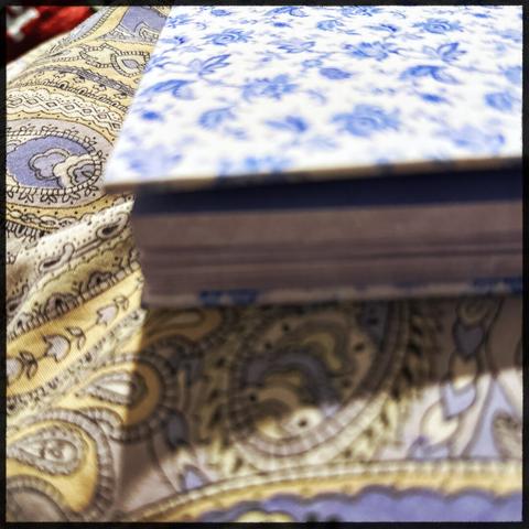 Book on a colourful duvet