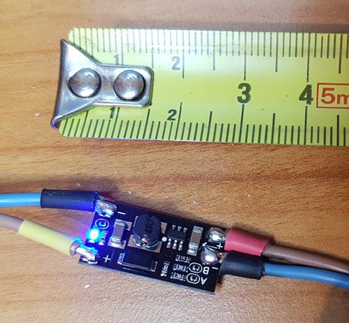 (METRIC) that DC-DC booster is friggen TINY! (red = 5Vin, yellow = 12Vout)