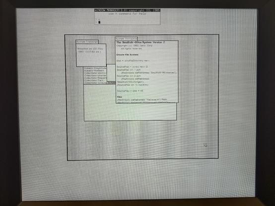 A monochrome graphical display from an old computer workstation. In a large window at the centre of the display, a Smalltalk-80 session can be seen, with a browser window partially occluded by a System Transcript and a System Workspace window.