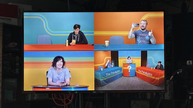 A monitor in the LRR studio showing a set for The Panalysts