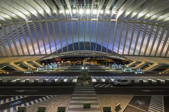 ght view on the train station by architect Santiago Calatrava, from a top view point. The shape and features of the building combined with a colourful lighting remind of a giant spaceship from a science fiction movie.