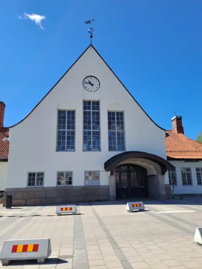 Photograph (colour): White station building