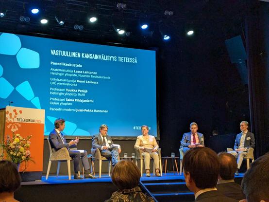 Panelists speaking on topics of responsibility, open science, security, academic freedom and geopolitical shifts at the forum.