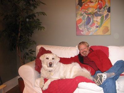 Mark sitting with his rescue, Ceilidh, way back in 2009