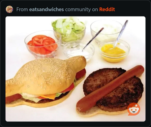 A miscarriage of culinary creation: a modified hamburger bun perfectly shaped to fit a centered hotdog with a hamburger split in two, on either side of the hot dog. Imagine a hamburger bun with two handles on either side, to accommodate the extra length of the hot dog.