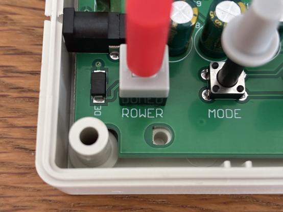 A pushbutton with red cap labeled "rower" instead if "power"