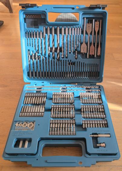 Photo of an open Makita box containing a whole host of drill bits and screw bits of different kinds.