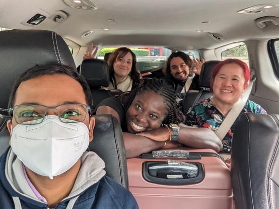 Group selfie of 5 people inside a taxi.
Pradyun, Maria Jose, Cristian, Mariatta, Abigail