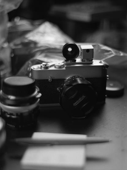 Photo by Caleb “bad flashes” Knueven on May 20, 2025. May be a black-and-white image of camera and text.