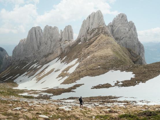 Rugged towers of rock in the Swiss Alps, Alpstein region. At almost 2000 meters, some snowfields can still be seen. 

Landscape photography by Marco Zedler