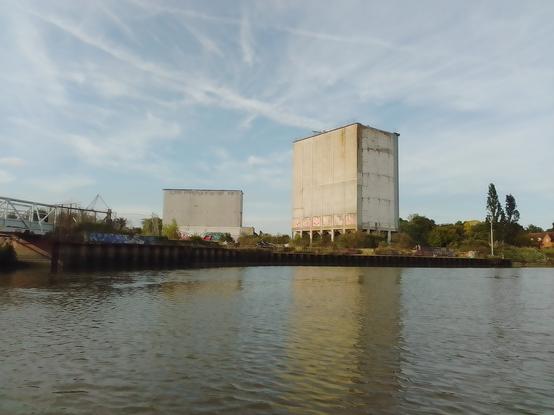Wondering who Crum might've been, who should've lived forever and fucked the pigs, according to the graffiti at the top of the wall of the building to the left. High water neapish at the millhead from the rowing dinghy.